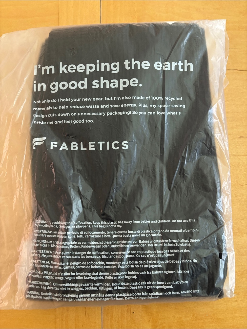 Fabletics Black Leggings with White Logo Text